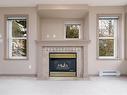 306-320 Menzies St, Victoria, BC  - Indoor Photo Showing Living Room With Fireplace 