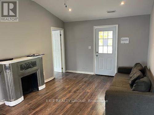 15 Brown Street, Belleville, ON - Indoor Photo Showing Other Room With Fireplace