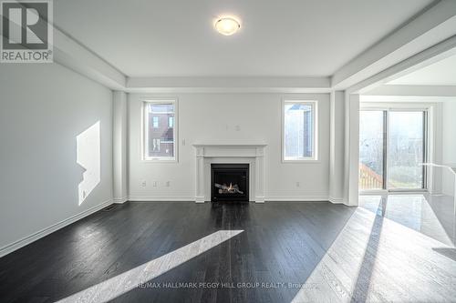 713 Mika Street, Innisfil, ON - Indoor Photo Showing Other Room With Fireplace