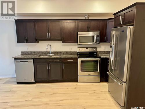 207 412 Willowgrove Square, Saskatoon, SK - Indoor Photo Showing Kitchen