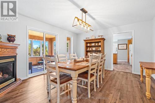 4374 Duff Road, South Frontenac (Frontenac South), ON - Indoor Photo Showing Dining Room With Fireplace