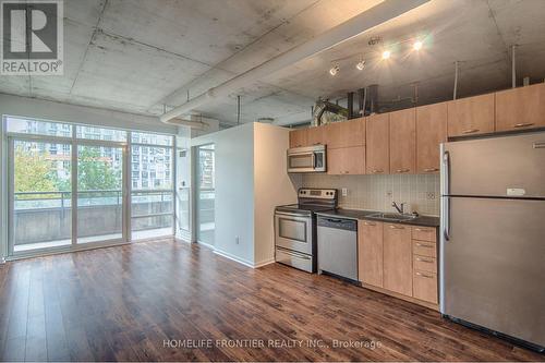 323 - 38 Joe Shuster Way, Toronto, ON - Indoor Photo Showing Kitchen With Stainless Steel Kitchen With Double Sink