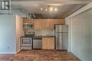 323 - 38 Joe Shuster Way, Toronto, ON  - Indoor Photo Showing Kitchen With Stainless Steel Kitchen 