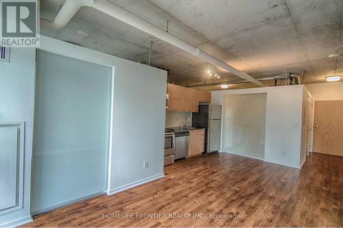 323 - 38 Joe Shuster Way, Toronto, ON - Indoor Photo Showing Kitchen