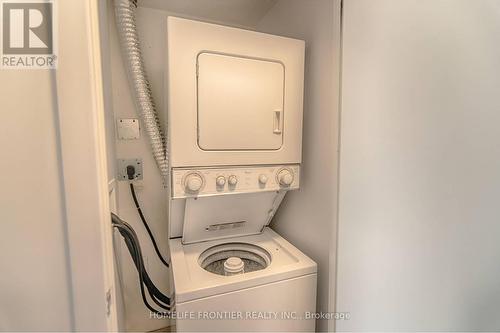 323 - 38 Joe Shuster Way, Toronto, ON - Indoor Photo Showing Laundry Room