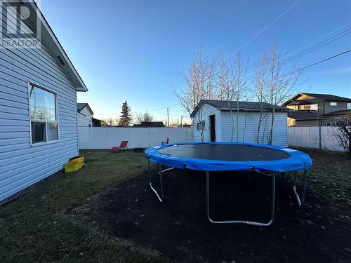 1104 120 Avenue, Dawson Creek, BC - Outdoor With Backyard