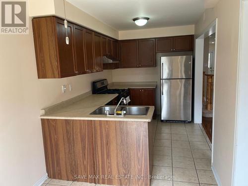 31 Tanasi Road, Brampton, ON - Indoor Photo Showing Kitchen With Double Sink