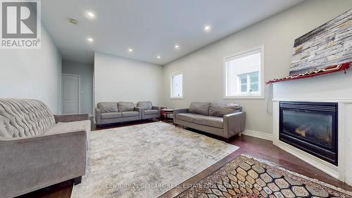 228 Lormel Gate S, Vaughan, ON - Indoor Photo Showing Living Room With Fireplace