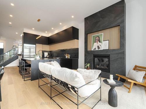 99 Yardley Ave, Toronto, ON - Indoor Photo Showing Living Room With Fireplace