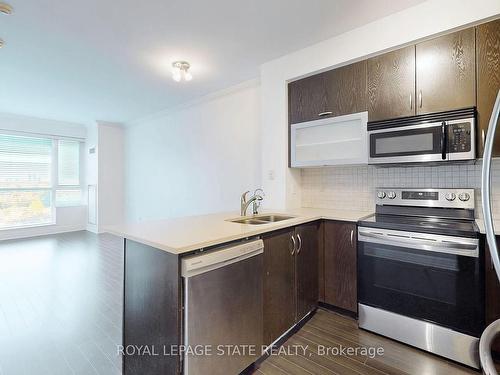 702-20 Gothic Ave, Toronto, ON - Indoor Photo Showing Kitchen With Double Sink