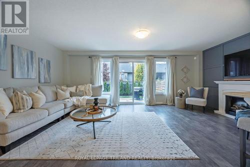 46 - 2040 Shore Road, London, ON - Indoor Photo Showing Living Room With Fireplace