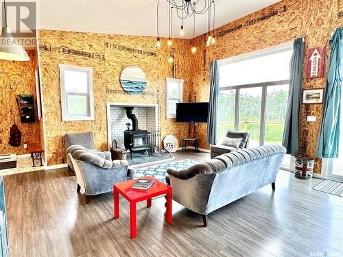 117 Ravine Road, Big Shell, SK - Indoor Photo Showing Living Room With Fireplace