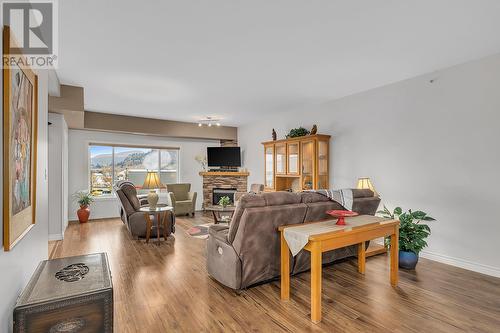 413-1961 Durnin Road, Kelowna, BC - Indoor Photo Showing Living Room With Fireplace