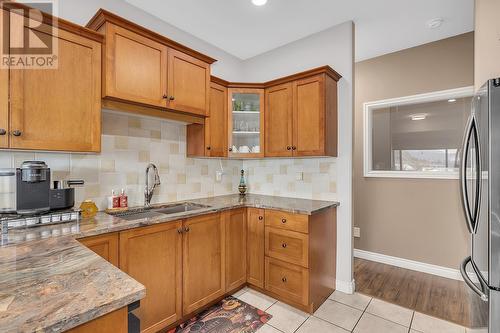 413-1961 Durnin Road, Kelowna, BC - Indoor Photo Showing Kitchen With Double Sink