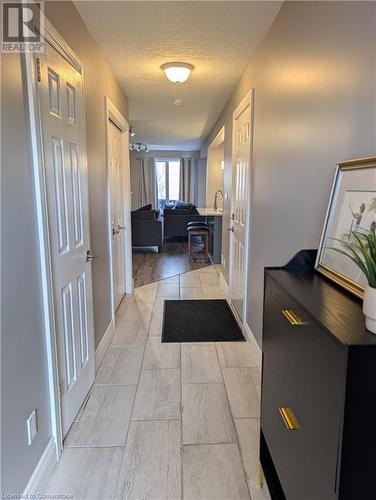 Corridor with a textured ceiling - 642 Inglis Falls Place, Waterloo, ON - Indoor Photo Showing Other Room