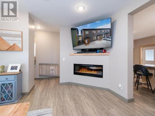 3-160 Leota Street, Whitehorse, YT - Indoor Photo Showing Living Room With Fireplace