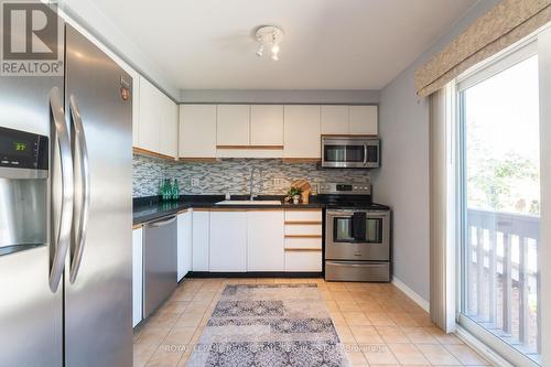 14 - 1160 Walden Circle, Mississauga, ON - Indoor Photo Showing Kitchen With Stainless Steel Kitchen With Upgraded Kitchen