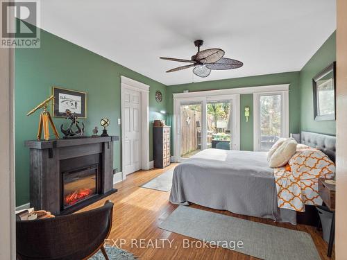 4330 Simcoe Street, Niagara Falls (210 - Downtown), ON - Indoor Photo Showing Bedroom With Fireplace