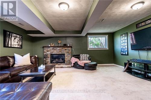 8 Dundee Drive, St. Catharines (455 - Secord Woods), ON - Indoor Photo Showing Living Room With Fireplace