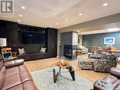 744 Washington Drive, Weyburn, SK - Indoor Photo Showing Living Room With Fireplace