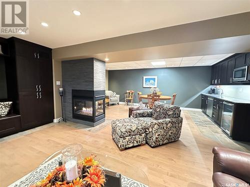 744 Washington Drive, Weyburn, SK - Indoor Photo Showing Living Room With Fireplace