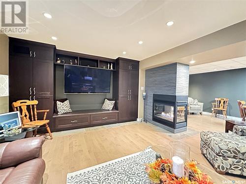 744 Washington Drive, Weyburn, SK - Indoor Photo Showing Living Room With Fireplace