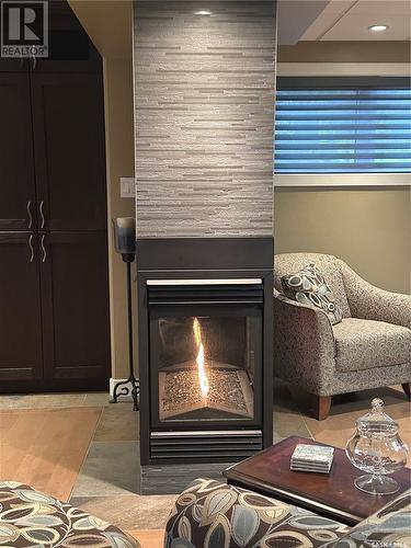 744 Washington Drive, Weyburn, SK - Indoor Photo Showing Living Room With Fireplace