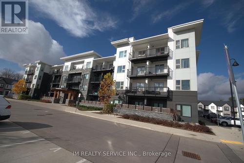 202 - 110 Fergus Avenue, Kitchener, ON - Outdoor With Balcony With Facade