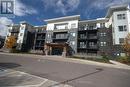 202 - 110 Fergus Avenue, Kitchener, ON  - Outdoor With Balcony With Facade 