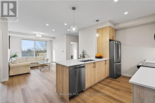 502 - 118 West Street, Port Colborne (878 - Sugarloaf), ON - Indoor Photo Showing Kitchen With Double Sink