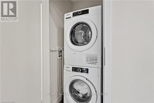 502 - 118 West Street, Port Colborne (878 - Sugarloaf), ON - Indoor Photo Showing Laundry Room