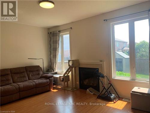 8817 Kudlac Street, Niagara Falls (219 - Forestview), ON - Indoor Photo Showing Living Room With Fireplace