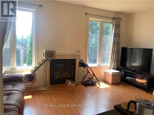 8817 Kudlac Street, Niagara Falls (219 - Forestview), ON - Indoor Photo Showing Living Room With Fireplace