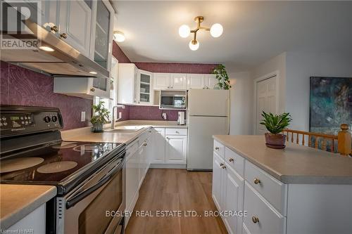 65 Chelsea Street, St. Catharines (450 - E. Chester), ON - Indoor Photo Showing Kitchen With Double Sink