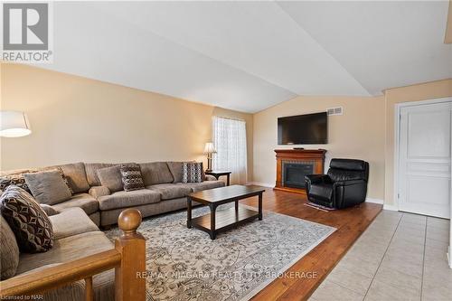 8119 Spring Blossom Drive, Niagara Falls (213 - Ascot), ON - Indoor Photo Showing Living Room With Fireplace