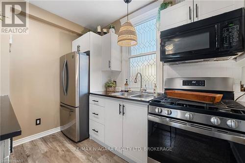 84 Steele Street, Port Colborne (878 - Sugarloaf), ON - Indoor Photo Showing Kitchen With Double Sink