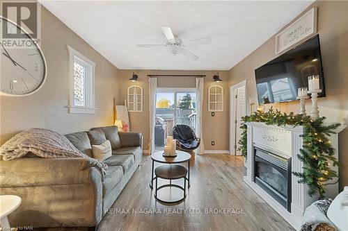 84 Steele Street, Port Colborne (878 - Sugarloaf), ON - Indoor Photo Showing Living Room With Fireplace