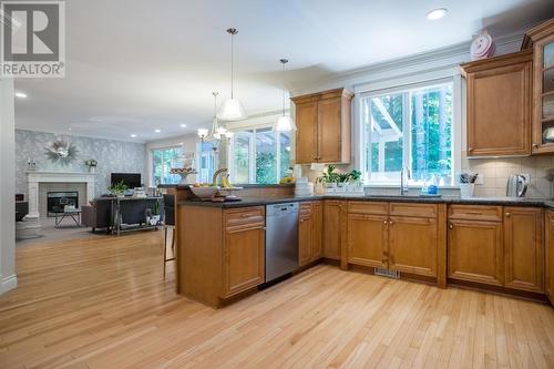 1239 W 22Nd Street, North Vancouver, BC - Indoor Photo Showing Kitchen With Fireplace