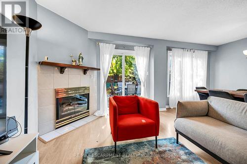 136 Essling Avenue, Hamilton, ON - Indoor Photo Showing Living Room With Fireplace