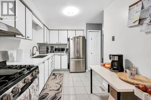 136 Essling Avenue, Hamilton, ON - Indoor Photo Showing Kitchen With Double Sink