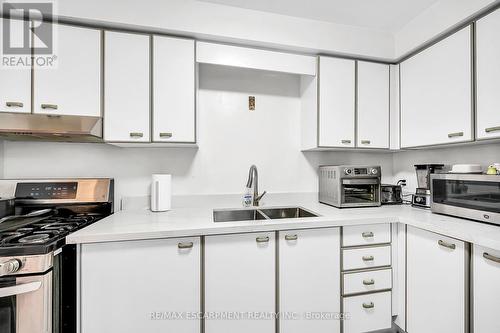 136 Essling Avenue, Hamilton, ON - Indoor Photo Showing Kitchen With Double Sink