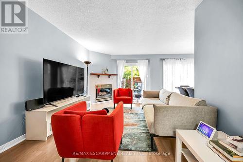 136 Essling Avenue, Hamilton, ON - Indoor Photo Showing Living Room With Fireplace