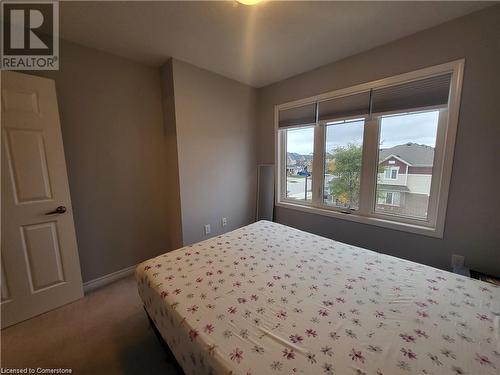 Bedroom featuring carpet - 39 Appleby Street, Kitchener, ON - Indoor Photo Showing Bedroom