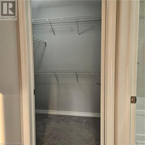 View of closet - 39 Appleby Street, Kitchener, ON - Indoor With Storage