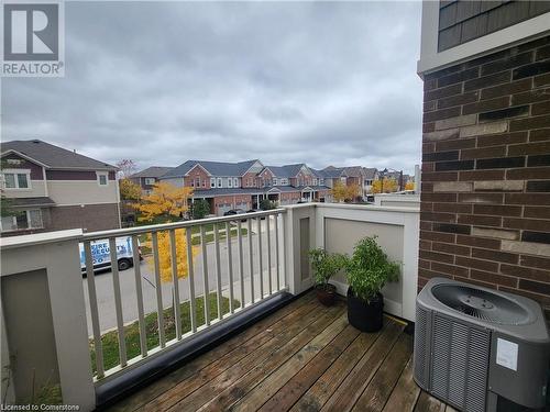 Wooden deck featuring cooling unit - 39 Appleby Street, Kitchener, ON - Outdoor With Balcony With Exterior