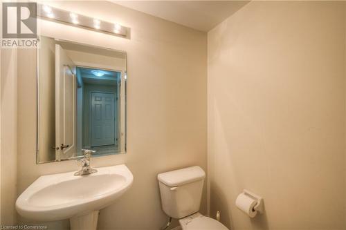 Bathroom featuring sink and toilet - 66 Abbott Crescent, Cambridge, ON - Indoor Photo Showing Bathroom