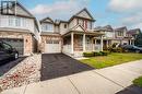 View of property with a garage, a front lawn, and a porch - 66 Abbott Crescent, Cambridge, ON  - Outdoor With Deck Patio Veranda With Facade 