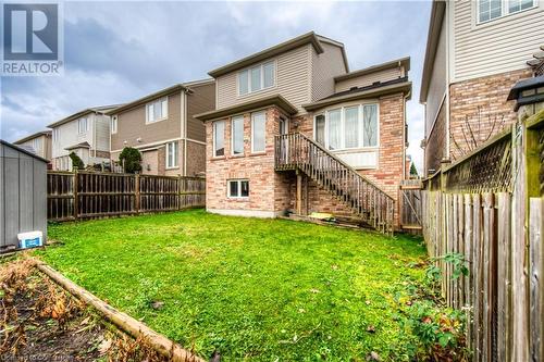 Rear view of property with a lawn - 66 Abbott Crescent, Cambridge, ON - Outdoor