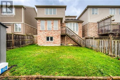 Back of house featuring a yard - 66 Abbott Crescent, Cambridge, ON - Outdoor