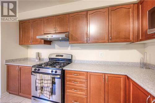 Kitchen featuring gas range and light tile patterned floors - 66 Abbott Crescent, Cambridge, ON - Indoor Photo Showing Kitchen